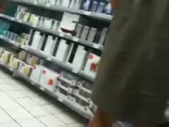 I would like to have sex with this mother, but she is unaware that she is being filmed at the supermarket.